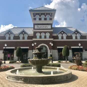 Blakeney Shopping Center | A fountain in front of a building