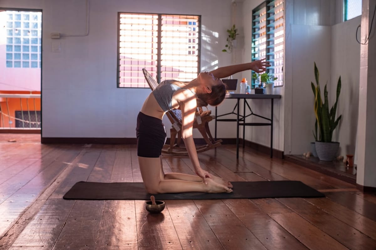 Create a Yoga Sanctuary | Woman Doing Yoga at Home