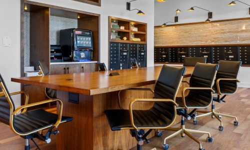 a room with a table and chairs