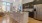 a kitchen with a bar and a table