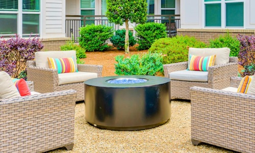 a group of chairs outside a house
