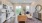 a large kitchen with a dining table
